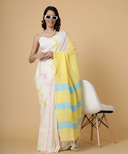 Handwoven linen saree crafted in cream colored base with stripes