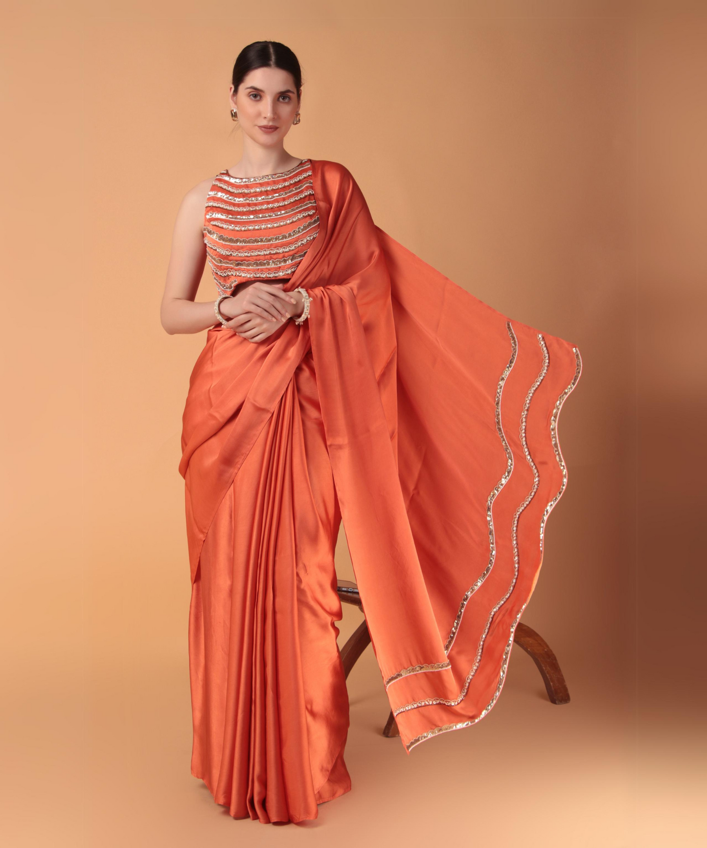 Orange Satin Hand Embroidered Cutwork Saree with Heavy Blouse