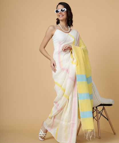 Handwoven linen saree crafted in cream colored base with stripes